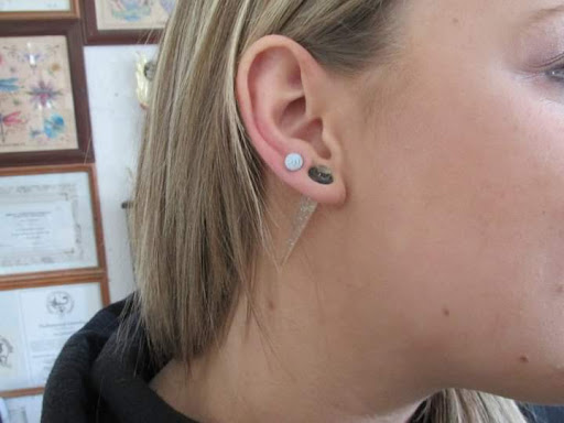Explore queen of spades tattoo ideas, creative tattoo ideas in Elko, available at Custom Tattoos and Body Piercing Studio