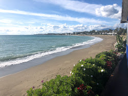 Photo de Torre Ancon beach avec baie longue