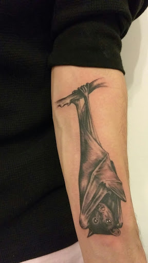 Explore solid black tattoo ideas, creative tattoo ideas in Hebron, available at Explosive Ink Tattoo