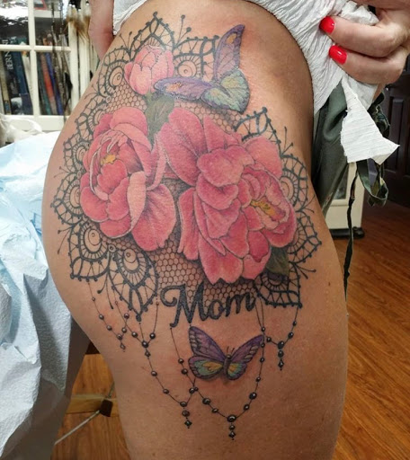 Explore saturn tattoo ideas, creative tattoo ideas in Glen Head, available at Twin Moon Creations