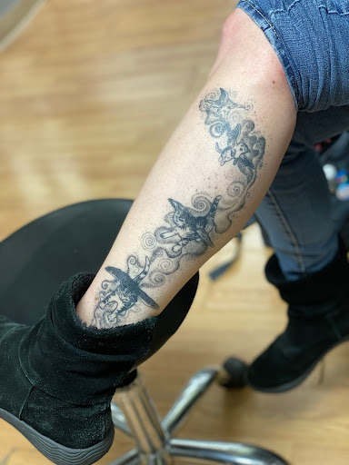 Explore back tattoo placement ideas, creative tattoo ideas in Warren, available at Eclectic Body Art & Healing Studio