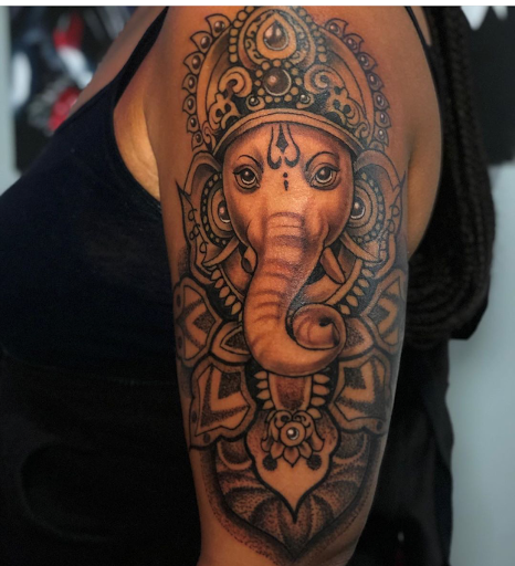 Explore watercolor tattoo ideas for females, creative tattoo ideas in Atlanta, available at Golden Anchor Tattoo