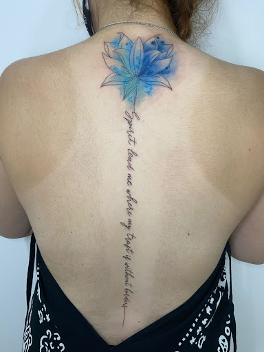 Explore hand small tattoo ideas, creative tattoo ideas in Goose Creek, available at Red Kirin Tattoo