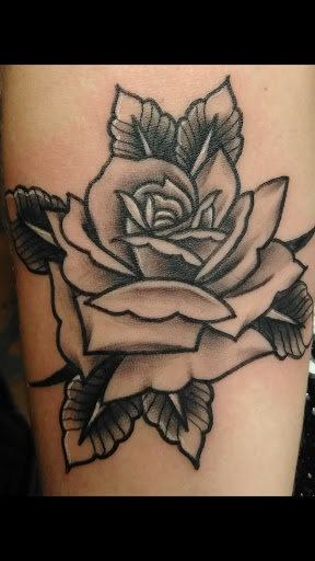 Explore bow and arrow tattoo ideas, creative tattoo ideas in Tucson, available at Sacred Art Tattoo Studio