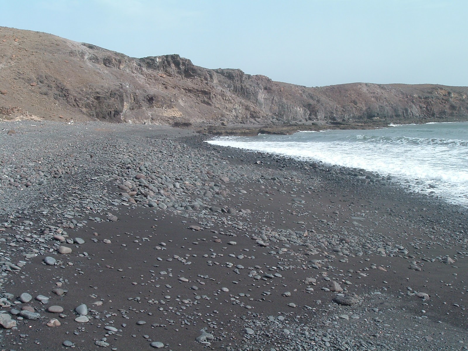 Foto van Playa del Caracol met blauw puur water oppervlakte