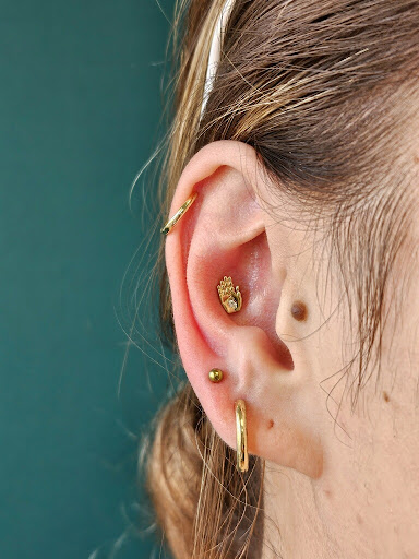Explore name on neck tattoo ideas, creative tattoo ideas in Visalia, available at La Luna Piercings and Fine Jewelry