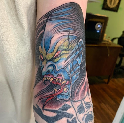 Explore lion cub tattoo ideas, creative tattoo ideas in Reno, available at Evolution Tattoo