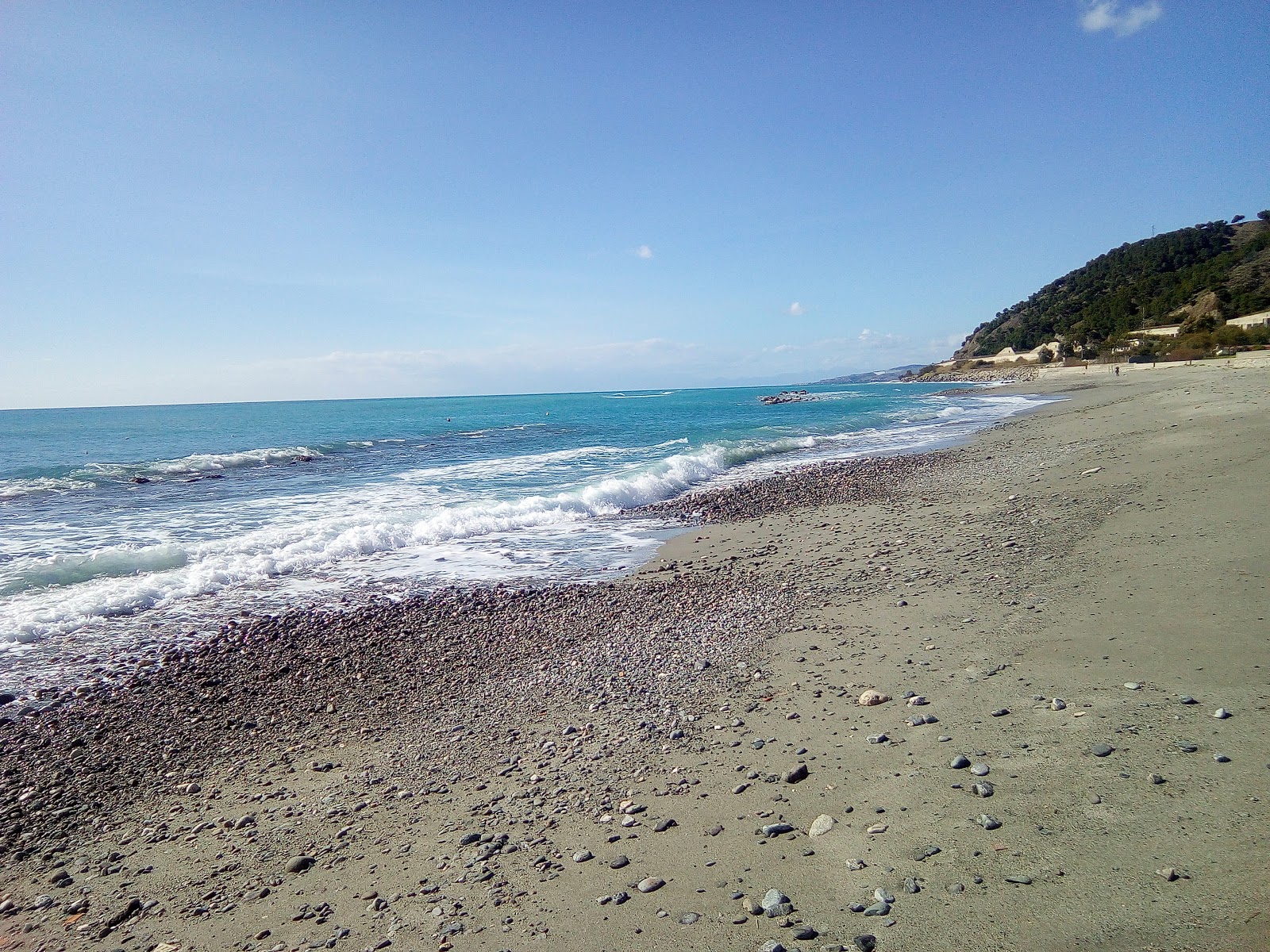 Fotografie cu Ultima Spiaggia cu o suprafață de nisip gri
