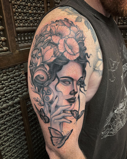 Explore ankle and foot tattoo ideas, creative tattoo ideas in Naples, available at 1808 Tattoo