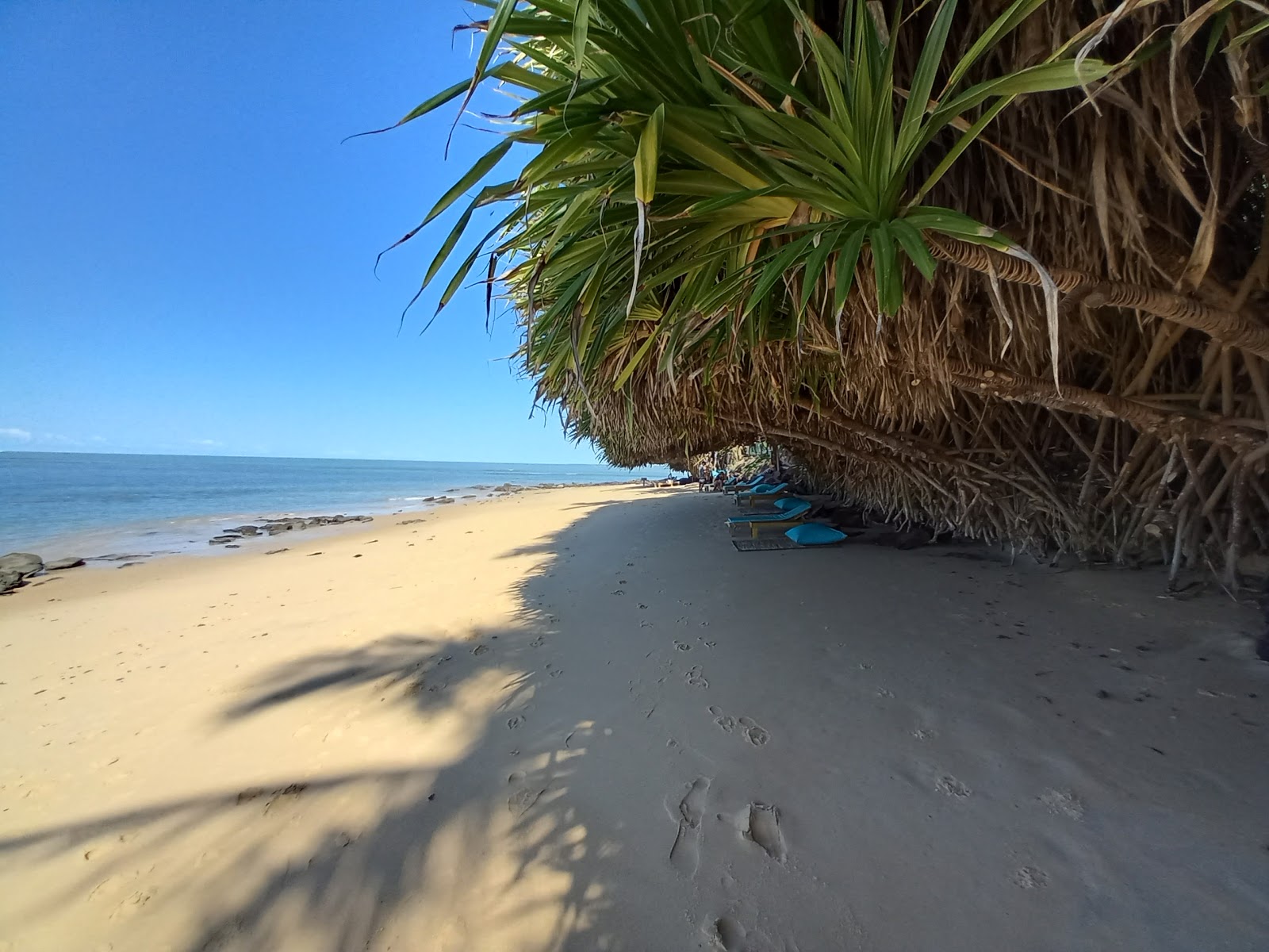 Foto av Satu strand med lång rak strand