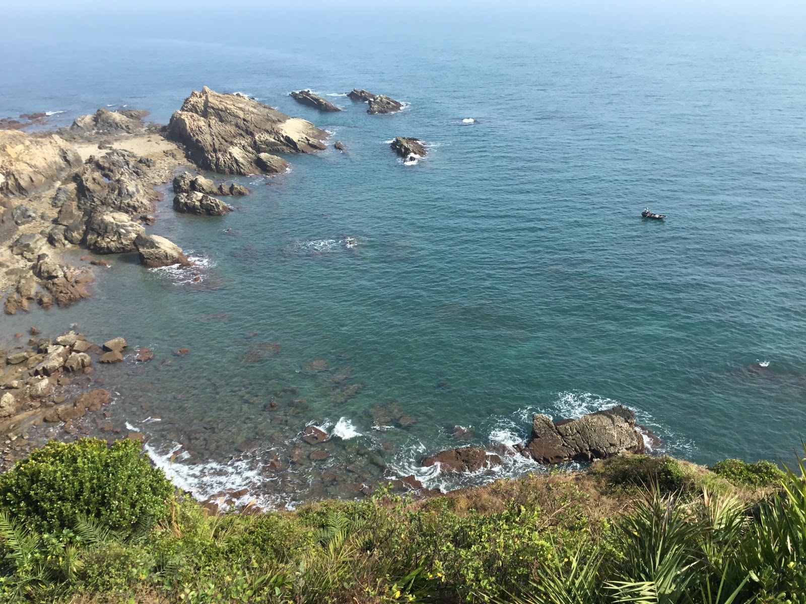 Bridge rocks beach的照片 带有岩石地形表面
