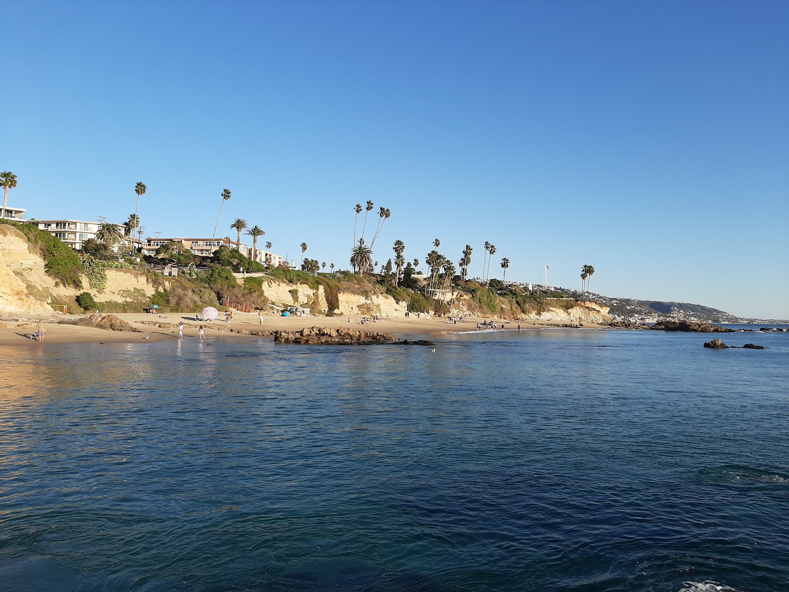 Foto von Diver's Cove mit türkisfarbenes wasser Oberfläche