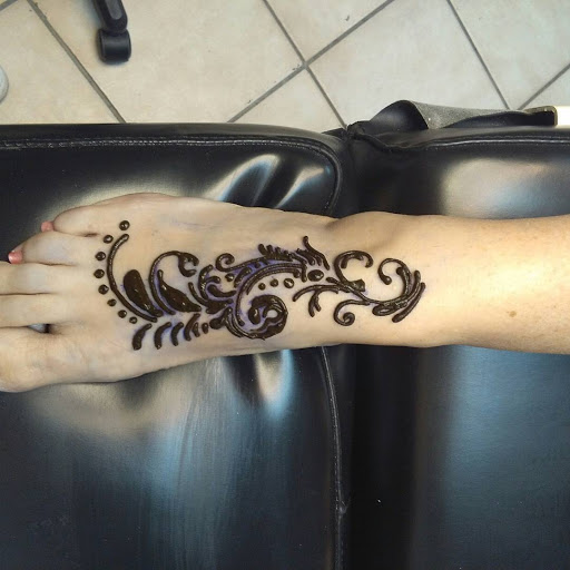 Explore watercolor tattoo ideas for females, creative tattoo ideas in Bradenton, available at Memory Lane Tattoo Co.