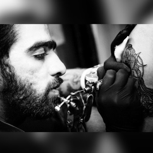 Explore rose idea tattoos, creative tattoo ideas in Rockville, available at MOCO Ink