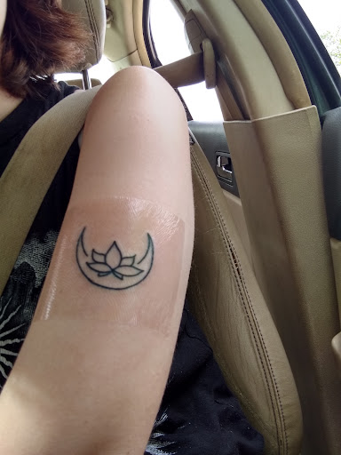 Explore lilac tattoo ideas, creative tattoo ideas in Abilene, available at Sacred Art