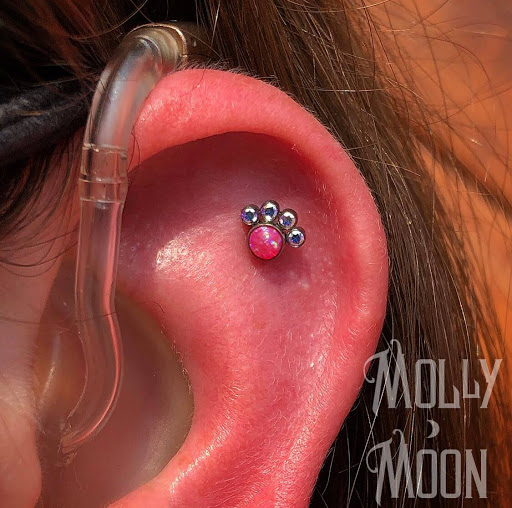 Explore tattoo cover up ideas on neck, creative tattoo ideas in Oshkosh, available at Piercings by Molly Moon at 920 Tattoo and Piercing
