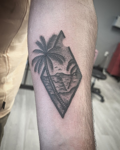 Explore mens tattoo ideas leg, creative tattoo ideas in Cocoa, available at Rorschach Tattoo Shop and Piercing Studio