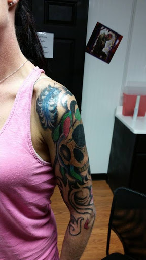 Tattoo Shop «Evil ink tattoo & piercings smokeshop», reviews and photos, 109 Hot Wheels Ln, McMinnville, TN 37110, USA