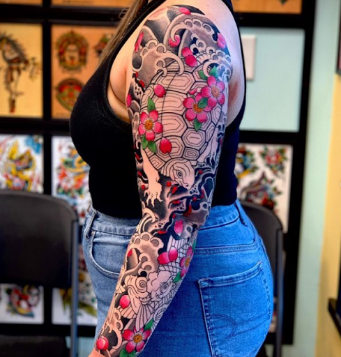 Explore tattoo ideas thigh, creative tattoo ideas in Virginia Beach, available at Salt Water Tattoo