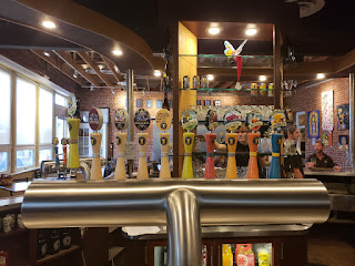 A pint of beer on a bar