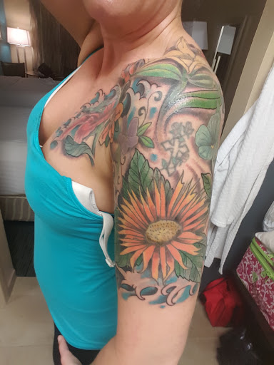 Explore men's back tattoos ideas, creative tattoo ideas in Charleston, available at Broken Lantern Tattoo