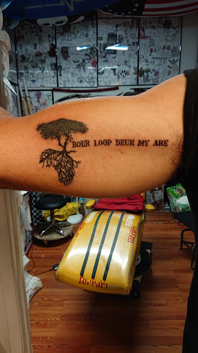 Explore hand tattoo ideas for man, creative tattoo ideas in Jonesboro, available at Immortal Ink