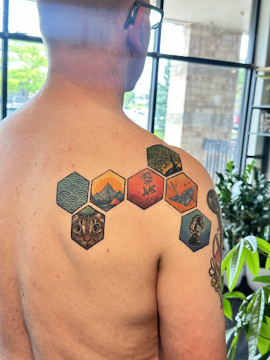 Explore punisher tattoo ideas, creative tattoo ideas in Omaha, available at Caffeinated Caterpillar Tattoo Spa