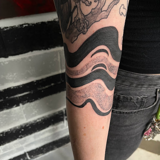 Explore big cat tattoo ideas, creative tattoo ideas in Buffalo, available at True Gloom Tattoo Studio