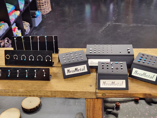 Find owl tattoo ideas for guys for your next unique tattoo in Great Falls at Three Moons Body Shop