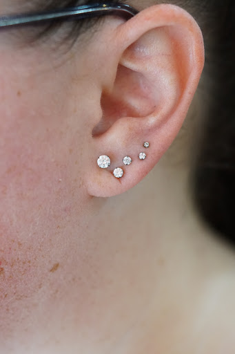 Explore trust no one tattoo ideas, creative tattoo ideas in San Jose, available at Make Me Holey Body Piercing