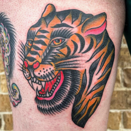 Explore fist bump tattoo ideas, creative tattoo ideas in Georgetown, available at Iron Rite Tattoo South