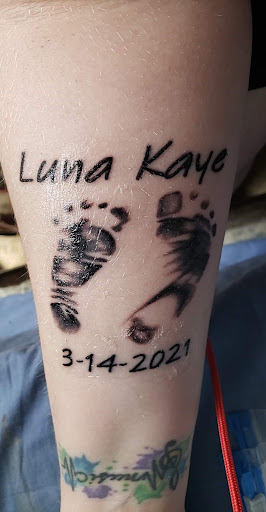 Explore baby foot print tattoo ideas, creative tattoo ideas in Owensboro, available at The Asylum Tattoo And Art Gallery