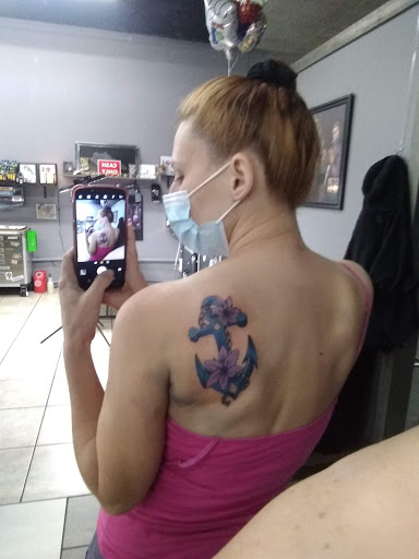 Explore wisdom tattoo ideas, creative tattoo ideas in Paducah, available at Sacred Ink LLC