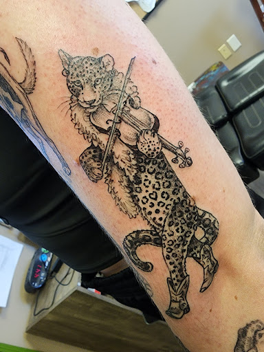 Explore calvin and hobbes tattoo ideas, creative tattoo ideas in Prescott, available at Geister Ink Tattoos