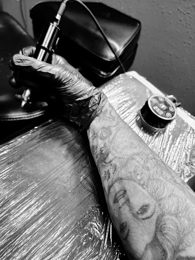 Explore half sleeve tattoo cover up ideas, creative tattoo ideas in Yankton, available at Exquisite Ink