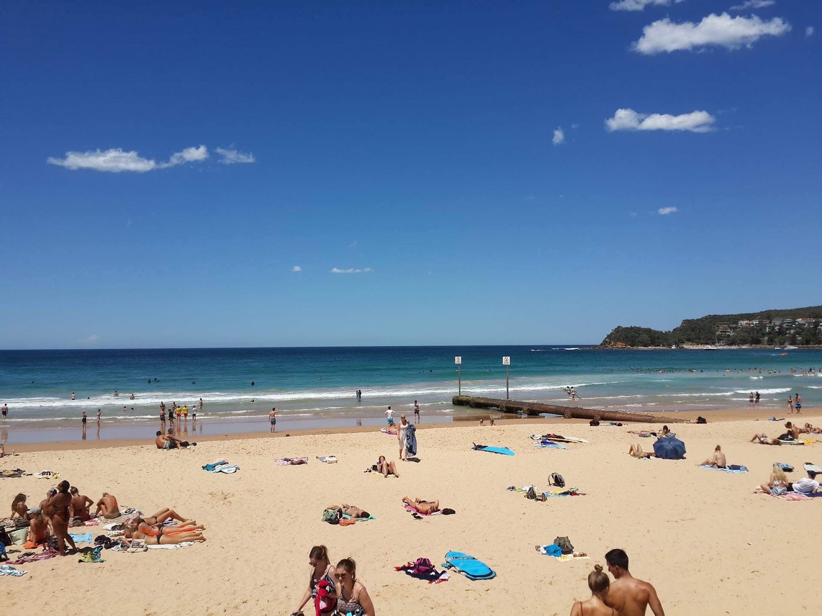 Photo of Manly Beach with blue pure water surface