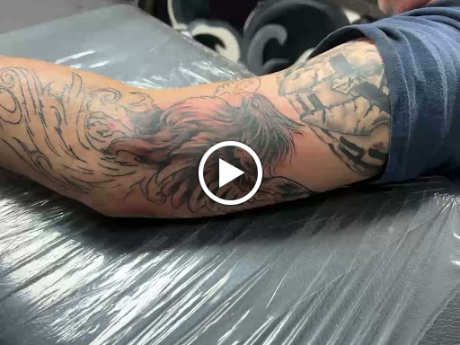 Explore surrender tattoo ideas, creative tattoo ideas in Jefferson, available at Slammin Ink Tattoo