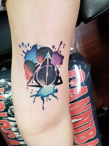 Explore money rose tattoo ideas, creative tattoo ideas in Lakewood, available at 3rd Rock Tattoos and piercings