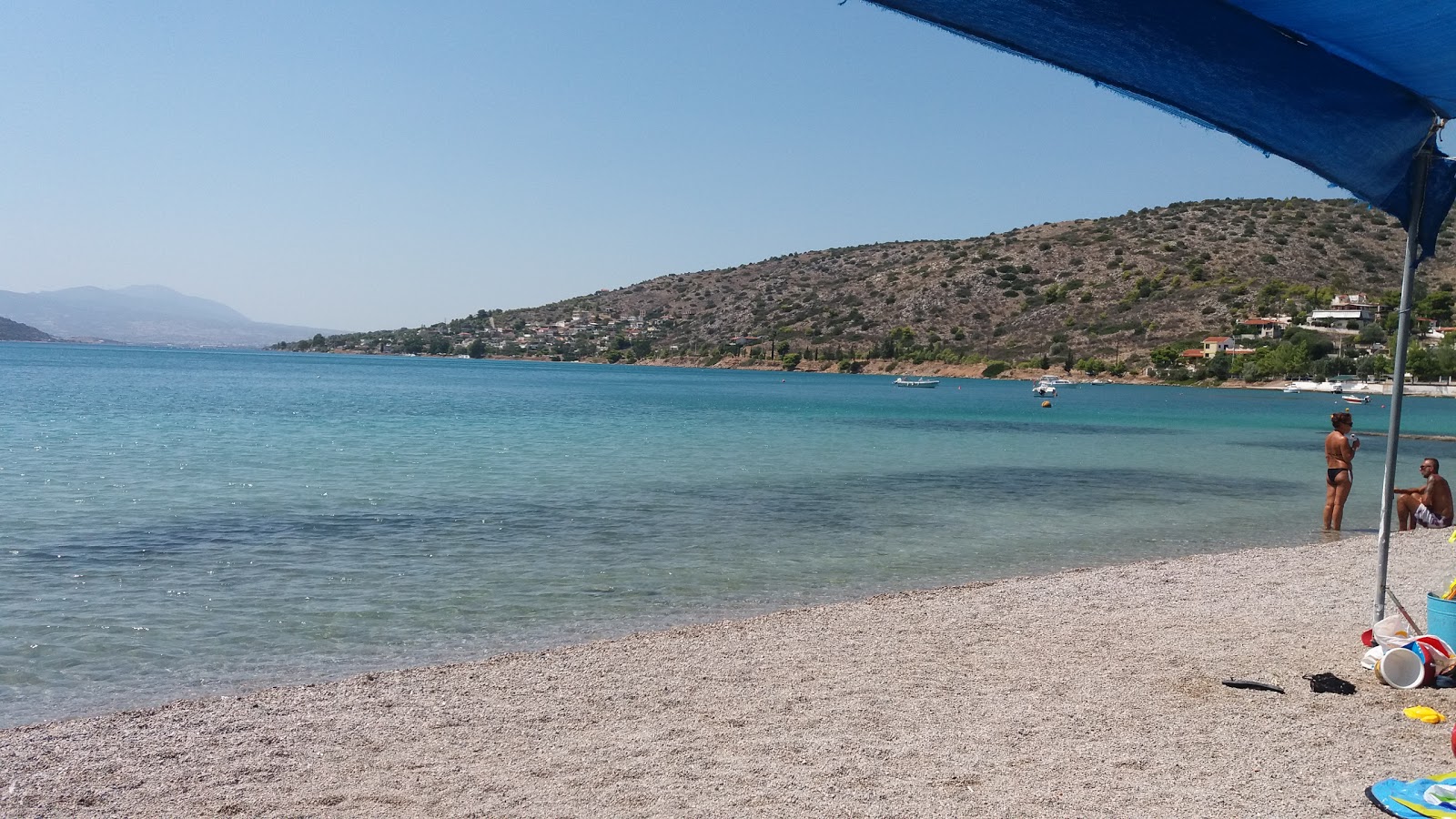 Fotografie cu Paralia Agios Georgios - locul popular printre cunoscătorii de relaxare