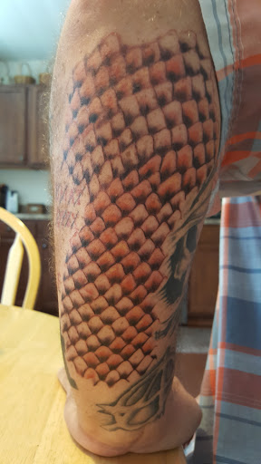Explore luke combs tattoo ideas, creative tattoo ideas in Gastonia, available at Chaos Tattoos