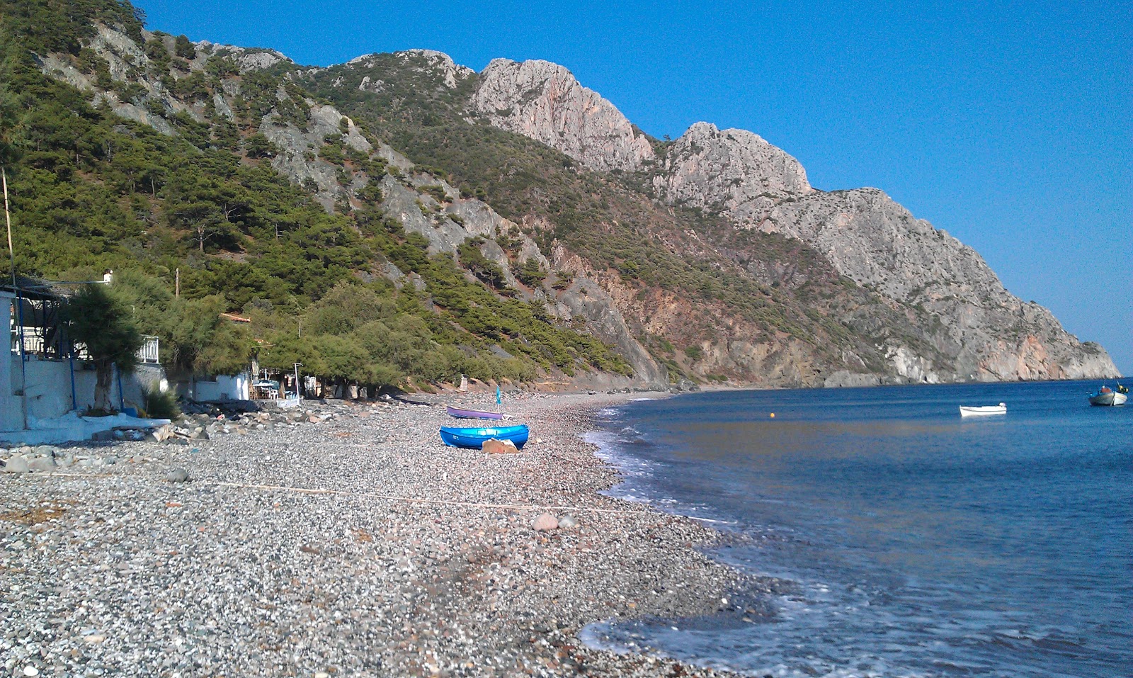 Photo of Drotas beach with light sand &  pebble surface