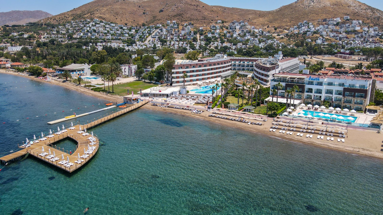Foto di AVTA Tatil Koyu Iskelesi Plaji con una superficie del sabbia beige