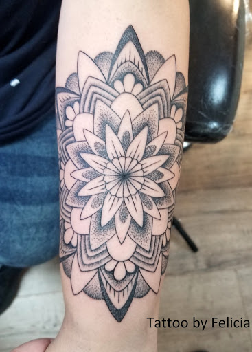 Explore tattoo ideas on side of stomach, creative tattoo ideas in Fort Myers, available at Tiger Lotus Tattoo and Piercing