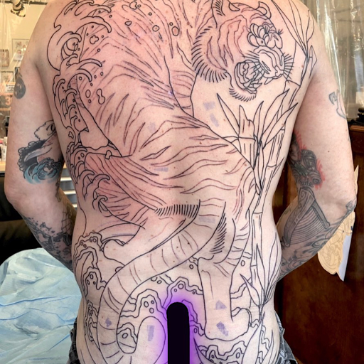 Explore stomach tattoo ideas for men, creative tattoo ideas in Phoenix, available at Forever True Tattoo