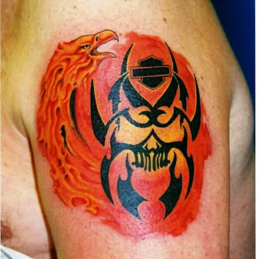 Explore upper leg tattoo ideas, creative tattoo ideas in Lufkin, available at Blue Lotus Tattoo & Piercing