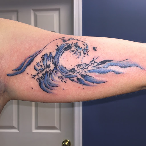 Explore hand and wrist tattoo ideas, creative tattoo ideas in Seaford, available at Irish Buddha Tattoo Studio