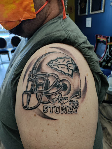 Explore number 4 tattoo ideas, creative tattoo ideas in Leavenworth, available at True Love Tattoo Club