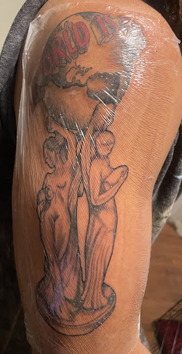 Explore sign language tattoo ideas, creative tattoo ideas in Williamsport, available at Gifted Body Art