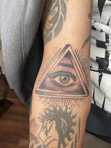 Explore male foot tattoo ideas, creative tattoo ideas in Washburn, available at Elevated Vision Tattoo Studio