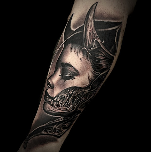 Find creative number tattoo ideas for your next unique tattoo in Altoona at Catharsis Tattoo Gallery